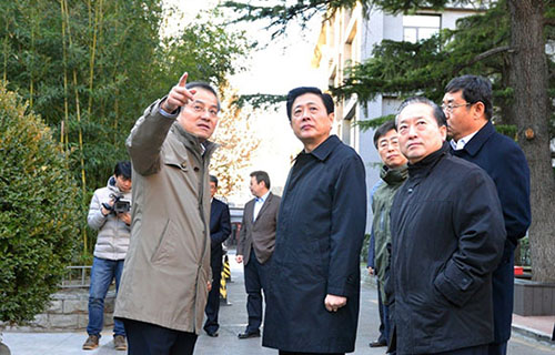 刘伟平到出版社调研.jpg
